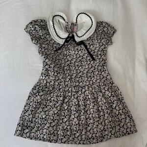 La Coqueta Black and White Floral Dress with Scalloped Collar